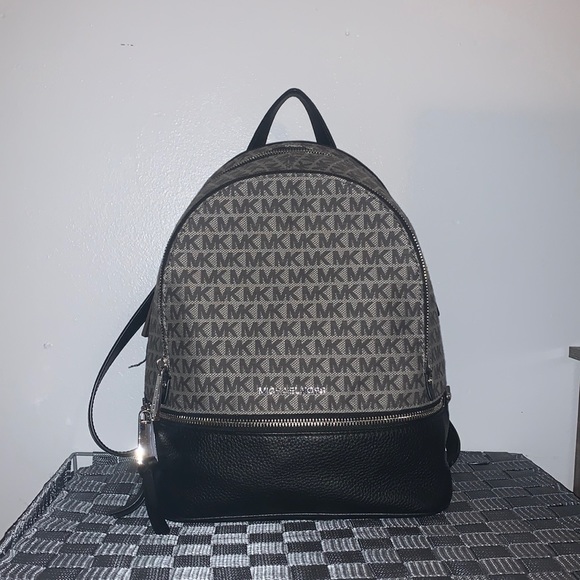 Grey ,Black, and silver Micheal kors backpack main image 3